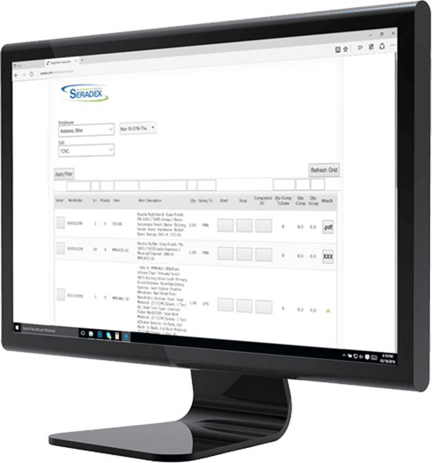 Computer monitor with Seradex ERP software displayed on the screen